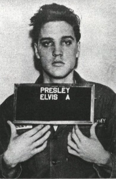Photo from www.reddit.com/r/pics/comments/3l1385/elvis_one_year_before_his_death_from_alcohol Elvis Presley mugshot after he was arrested for assault in 1956 : r/OldSchoolCool 