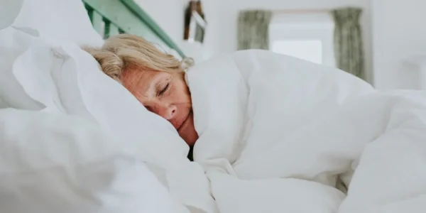 7 Sleep Habits Behind the T Rex Arm Position Doctors Say Can Leave You Numb, Stiff, and Waking up With Tingling Hands